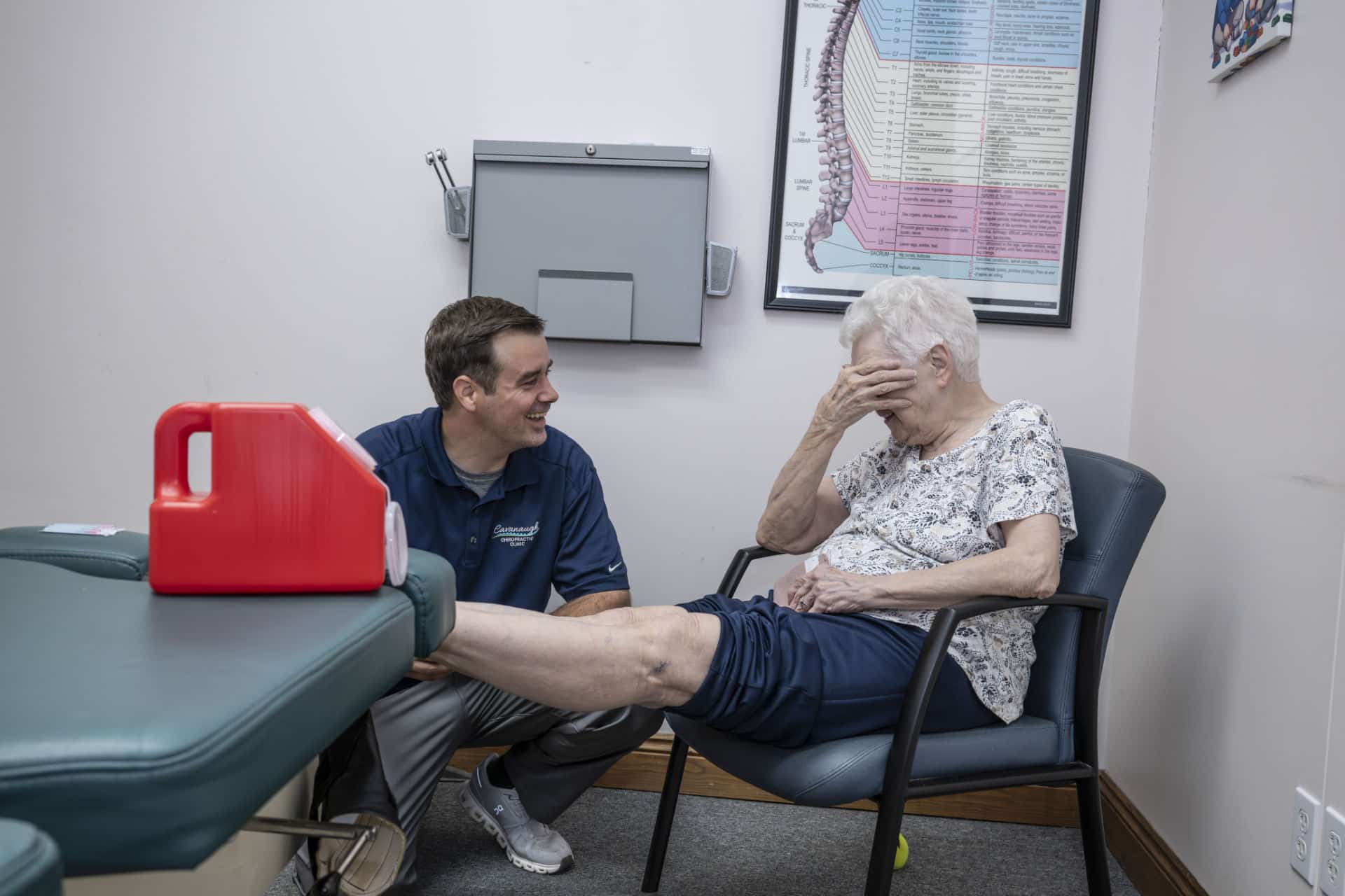 Chiropractor in Lafayette, LA preparing elderly patient for dry needling therapy